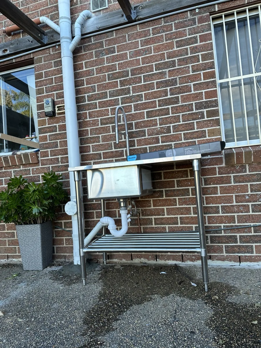 Outdoor sink waste and drainage pipework